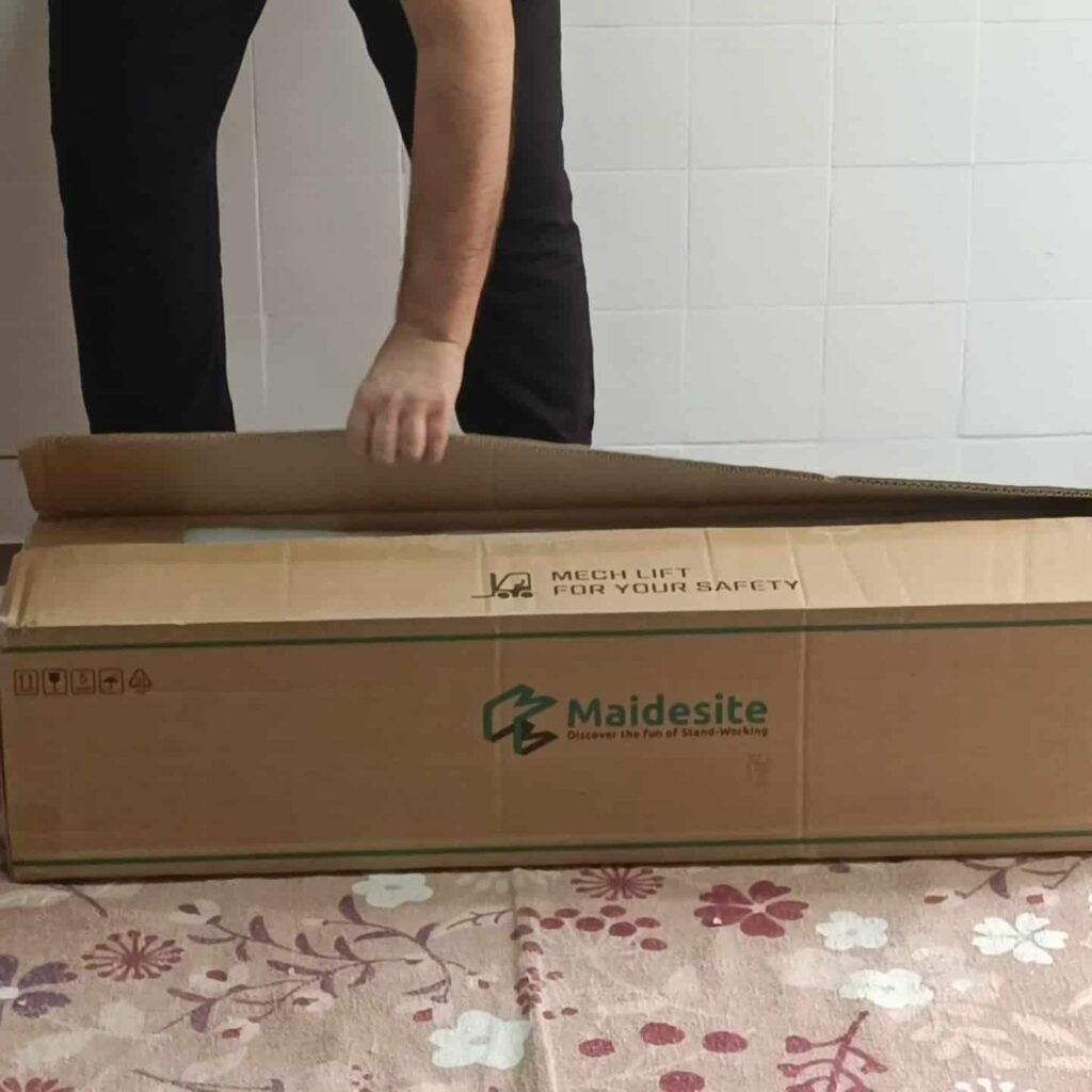 view of maidesite unboxing purchased package arrival home