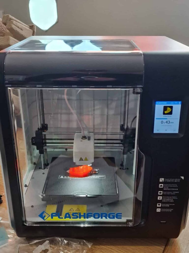 view-of-unboxed-the-Flashforge  3D Printer Under £300 UK-tried-and-tested-for-several-week-unboxing-purchased-package-arrival-at-home-testing-experience-